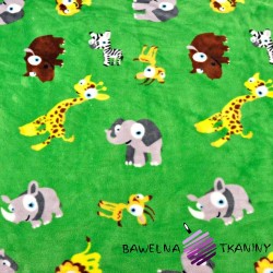Soft fleece with African animals on a green background