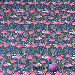 Cotton pink flamingos on an emerald background